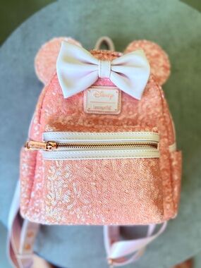 Loungefly Disney cotton candy Pink Sequin Mini Backpack with White Bow